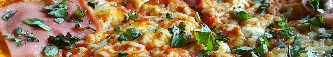 Eating Pizza Pub Food at Waukegan Bally Muck restaurant in Waukegan, IL.